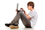 12846130-portrait-of-a-smart-young-man-with-a-laptop-isolated-over-white-background